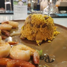 Shrimp with garlic and arroz con gandules Shrimp with garlic and arroz con gandules