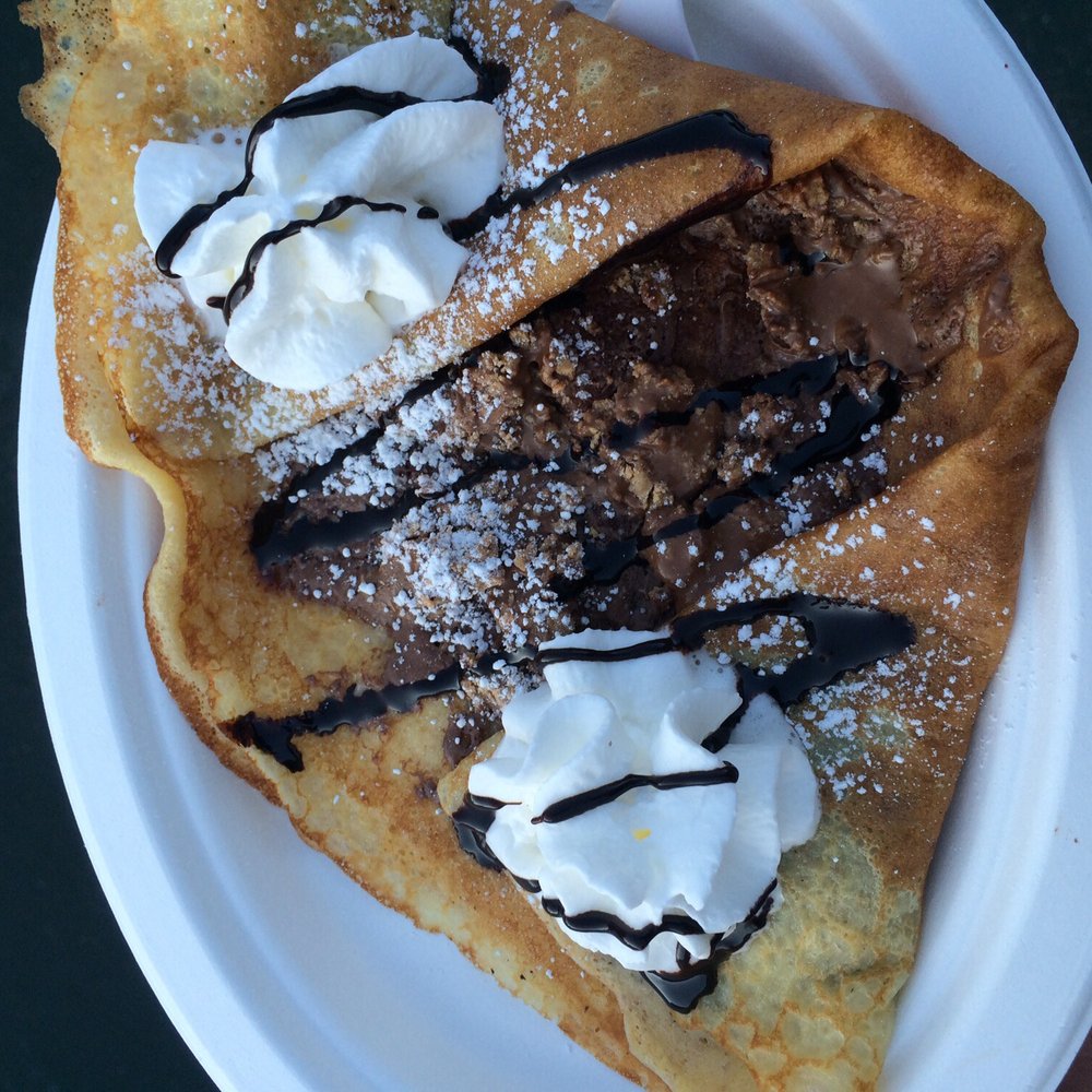 Cruisin' Crepes - Sweet Crepe with nutella spread, peanut butter cups, chocolate drizzle, & whipped cream. - Food Trucks Near Me Cruisin' Crepes - Sweet Crepe with nutella spread, peanut butter cups, chocolate drizzle, & whipped cream. - Food Trucks Near Me