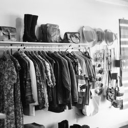 Valley Shoe Repair - clothing rack with jackets and some bags on top of a shelf