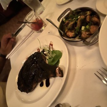 The Capital Grille - Soy Glazed Brussels Sprouts with Bacon and Bone-In Ribeye 22oz - Steakhouses Near Me - Memphis, Tennessee The Capital Grille - Soy Glazed Brussels Sprouts with Bacon and Bone-In Ribeye 22oz - Steakhouses Near Me - Memphis, Tennessee