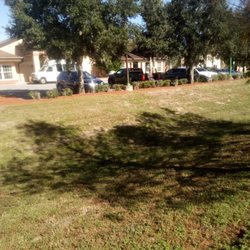 Hawthorne Village of Ocala - White smoking lady yelling at me at bus stop laughing at landscaping crew bothering me. Trash