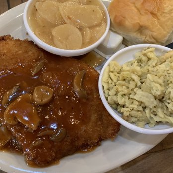 The Auslander - Jägerschnitzel with a delicious roll, German potato salad, and spaetzel. - German Near Me - Fredericksburg, Texas The Auslander - Jägerschnitzel with a delicious roll, German potato salad, and spaetzel. - German Near Me - Fredericksburg, Texas