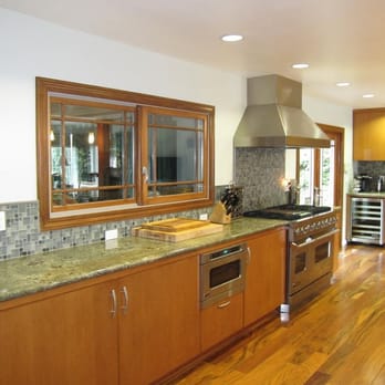 Marvin Davis Construction - kitchen with wood cabinets and stainless steel appliances - General Contractors Near Me - San Jose, California