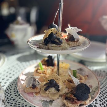 Miramont Castle - three tiered plates of food on a table - Tea Rooms Near Me - Manitou Springs, Colorado Miramont Castle - three tiered plates of food on a table - Tea Rooms Near Me - Manitou Springs, Colorado