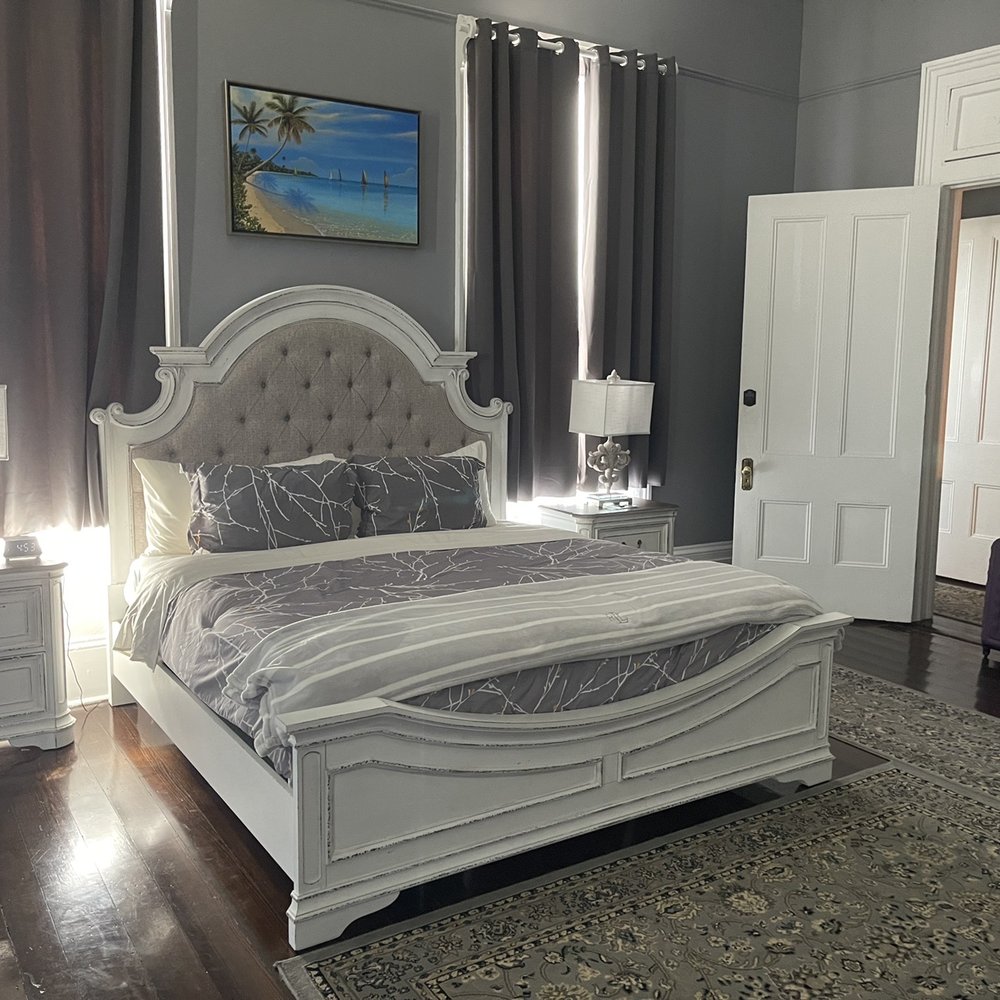 The George Manor - The White Suite is a spacious room located upstairs. Look at those high ceilings! - Bed & Breakfast Near Me - Galveston, Texas The George Manor - The White Suite is a spacious room located upstairs. Look at those high ceilings! - Bed & Breakfast Near Me - Galveston, Texas