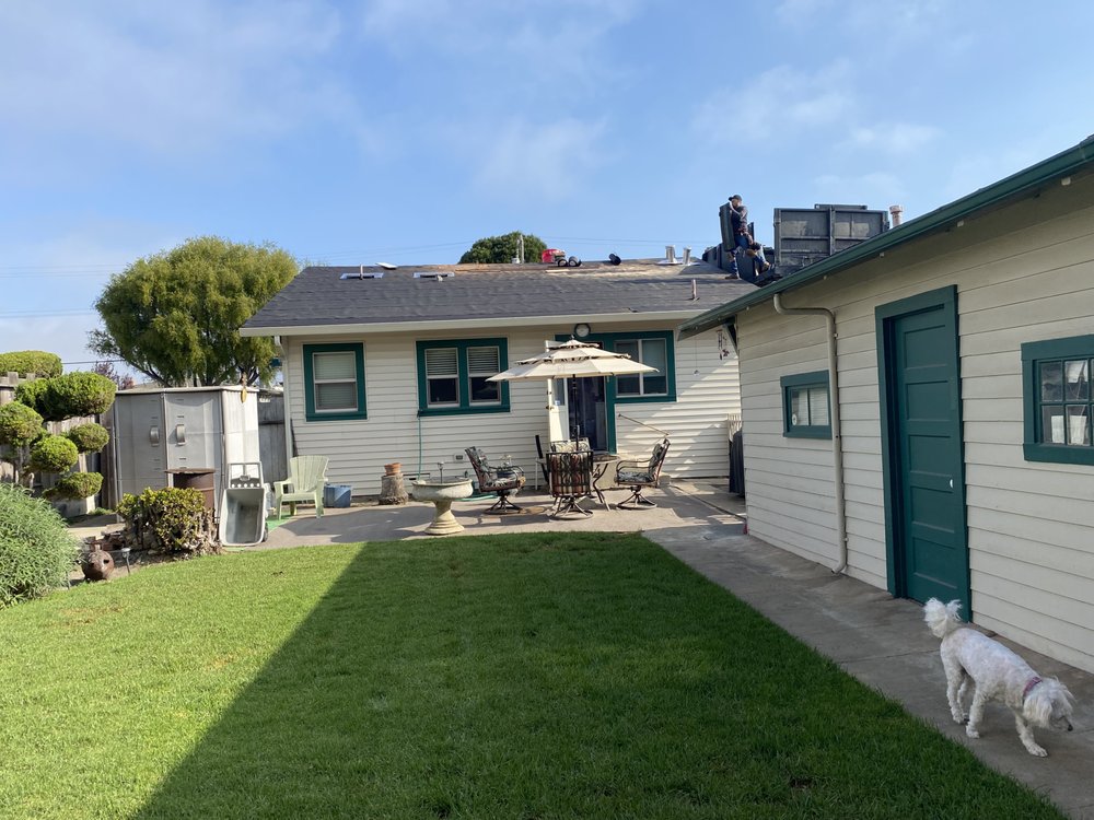 Slide of Urrutia Roofing