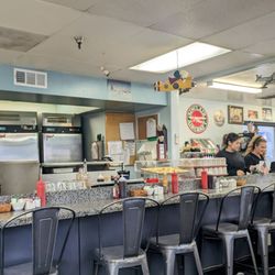 Hangar Cafe - Open kitchen with bar seating