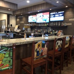 Peak at the bar....look at those beautiful chairs
