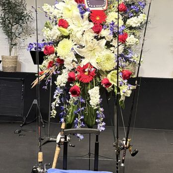 Blooming Events Florist - Celebration of Life personalized with fishing poles. - Florists Near Me - Palm Desert, California