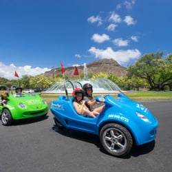 Hawaiian Style Rentals & Sales - Hawaiian Style Scoot Coupe going around Diamond Head.