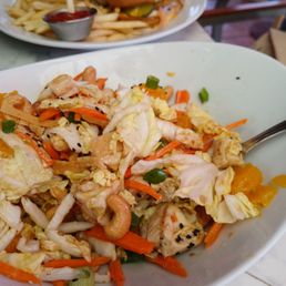 Chinese chicken salad in fore and fried chicken sandwich Chinese chicken salad in fore and fried chicken sandwich