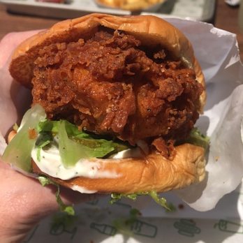 Shake Shack Southlake - Big bite in the works. Chicken Sammie - Fast Food Near Me - Southlake, Texas