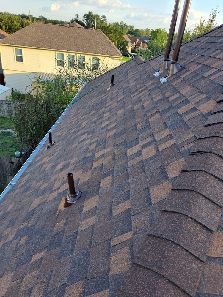 Slide of Truly Roofing & Construction