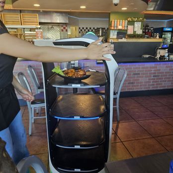 Pho Mex - Robot waiter bringing food - Asian Fusion Near Me - Modesto, California Pho Mex - Robot waiter bringing food - Asian Fusion Near Me - Modesto, California