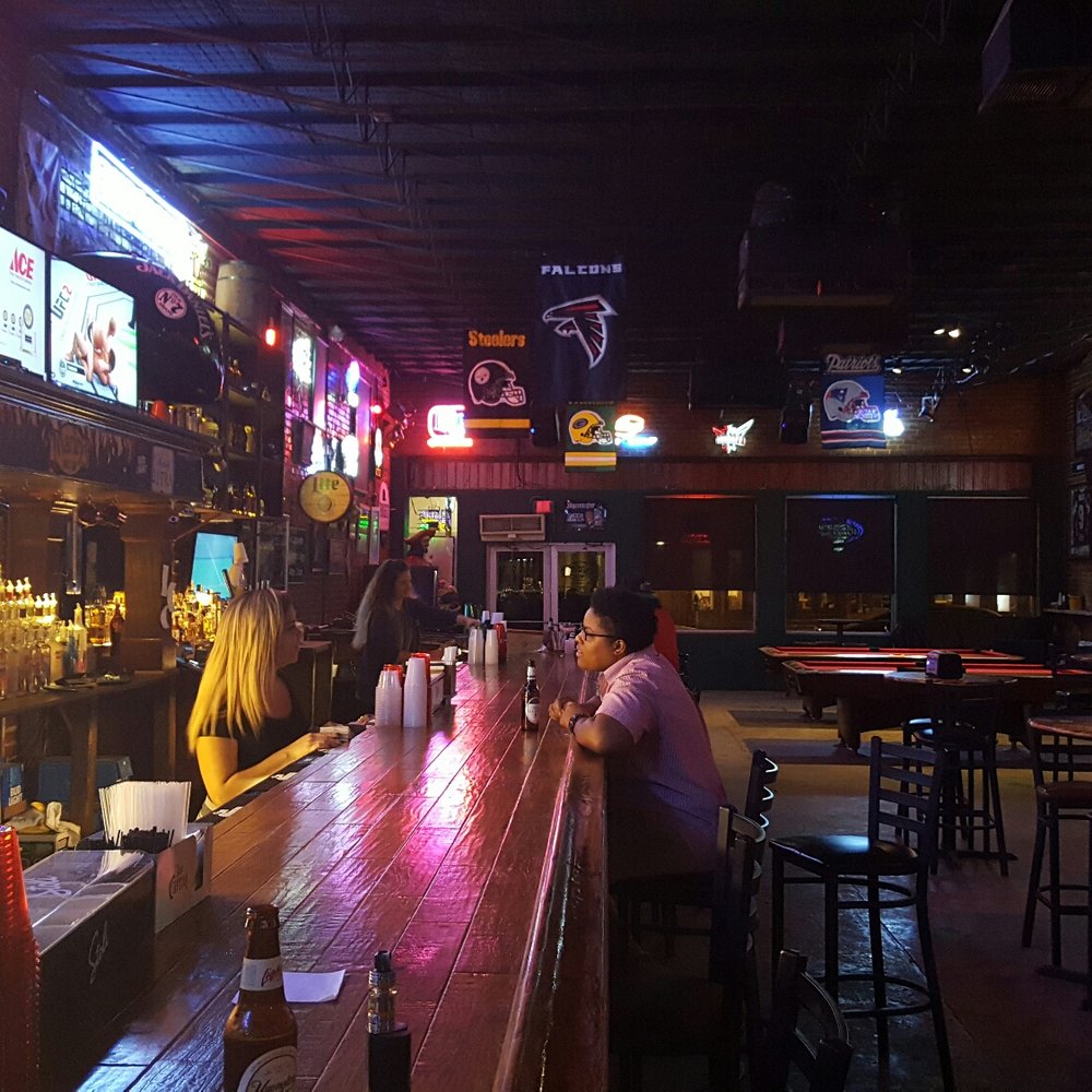 Marley's Sports Bar - people sitting at the bar - Sports Bars Near Me - Lafayette, Louisiana Marley's Sports Bar - people sitting at the bar - Sports Bars Near Me - Lafayette, Louisiana