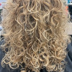 Malcolm's Haircutters - Curly Blond lites done by Melanie