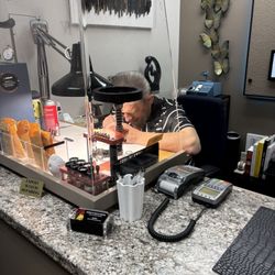 Andrey's Watch & Clock Repair - Working on a watch