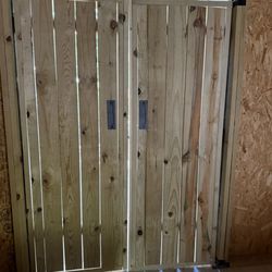 Magic City Repair and Remodel - Uneven doors. These should be even without gaps to be weather proofed.