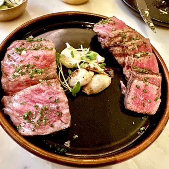Animae - L: A5 Wagyu strip loin, 4oz. R: A5 Wagyu tenderloin, 4oz. Grilled turnips in the middle. - Asian Fusion Near Me - San Diego, California Animae - L: A5 Wagyu strip loin, 4oz. R: A5 Wagyu tenderloin, 4oz. Grilled turnips in the middle. - Asian Fusion Near Me - San Diego, California