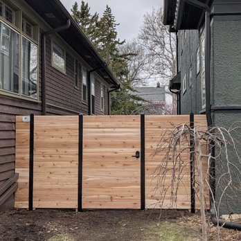 Deck & Fence Solutions - New fence with door installed - Fences & Gates Near Me