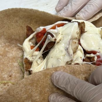 Burns Park Deli - Breaded Chicken, Roasted Red Peppers, Melted Mozzarella Wrapa - Delis Near Me - Massapequa, New York Burns Park Deli - Breaded Chicken, Roasted Red Peppers, Melted Mozzarella Wrapa - Delis Near Me - Massapequa, New York