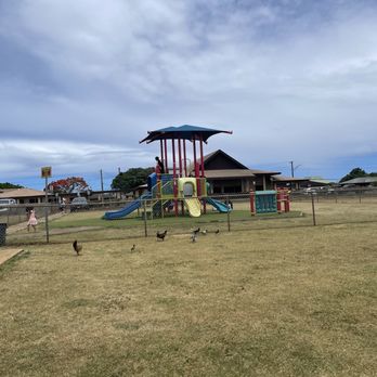 Isenberg Park - Two play structures. The big slide has steps up that require some climbing ability but saw kids as young as 2 able to do this. No swings. - Parks Near Me - Lihue, Hawaii