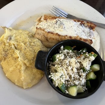 Red Fish Grill - Crab stuffed mahi, mashed potatoes and feta/cucumber salad - Seafood Near Me - Morehead City, North Carolina