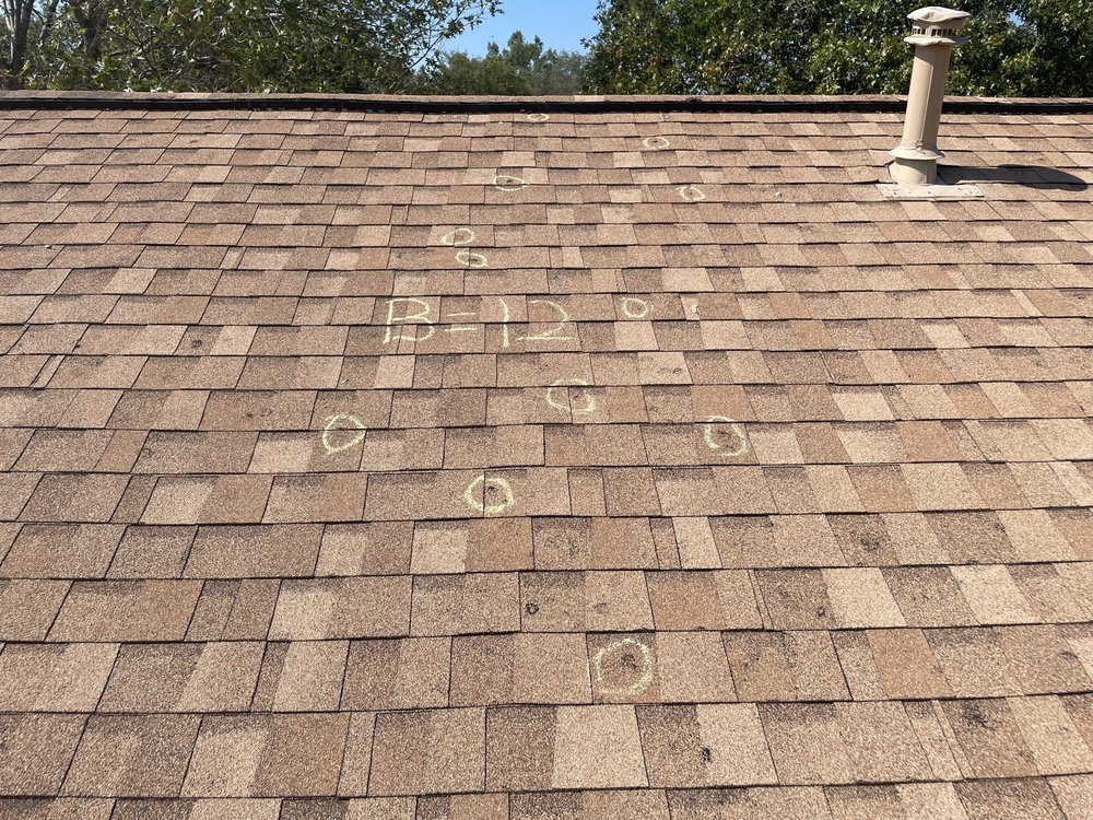 Slide of Laursen Roofing