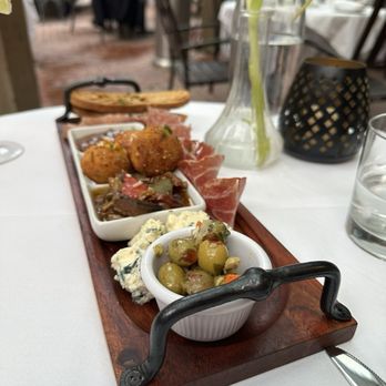 Irene's - Yummy mix of cheese, olives, arancini, etc. - Italian Near Me - New Orleans, Louisiana Irene's - Yummy mix of cheese, olives, arancini, etc. - Italian Near Me - New Orleans, Louisiana