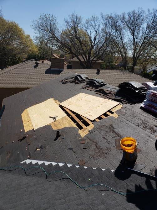 Slide of Luy's Roofing