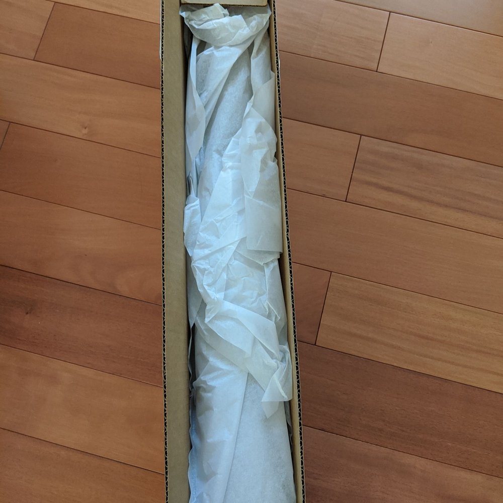Paper Tree - Opened package with paper rolled and wrapped neatly in tissue paper and in waterproof paper. - Art Supplies Near Me - San Francisco, California Paper Tree - Opened package with paper rolled and wrapped neatly in tissue paper and in waterproof paper. - Art Supplies Near Me - San Francisco, California