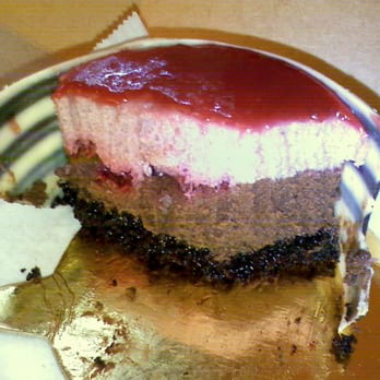 Masse's Pastries - raspberry & chocolate mousse, dark chocolate cake, white & milk chocolate covering - Bakeries Near Me - Berkeley, California