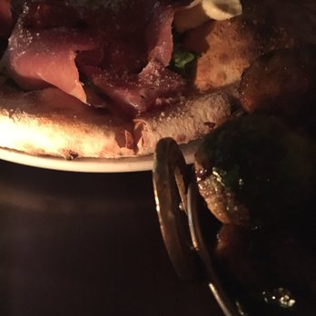 The Good Son - Super dark pict of the sambal Brussels and prosciutto pizza.  Pizza was very good... Brussels was good but sauce touch too salty - Pizza Near Me - Toronto, Ontario