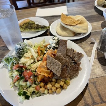 Dimassi's Mediterranean Buffet - Lamb strips, Chickpea Salad, 2 kinds of pasta, Cabbage Salad, spinach w/feta, broccoli w/some sauce, pizza bread and a Pita Bread. - Mediterranean Near Me - Irving, Texas Dimassi's Mediterranean Buffet - Lamb strips, Chickpea Salad, 2 kinds of pasta, Cabbage Salad, spinach w/feta, broccoli w/some sauce, pizza bread and a Pita Bread. - Mediterranean Near Me - Irving, Texas