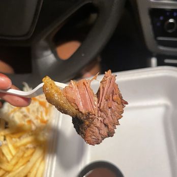 Bare Bones BBQ & Jerk - Half bitten super tender brisket with some fat - Barbeque Near Me - Pembroke Pines, Florida