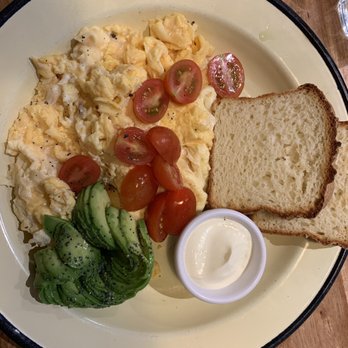 Adorado - Scrambled eggs with cheese and cherry tomatoes. - Breakfast & Brunch Near Me - Buenos Aires, C Adorado - Scrambled eggs with cheese and cherry tomatoes. - Breakfast & Brunch Near Me - Buenos Aires, C