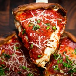 Bondi's Pizza - Chicago Deep Dish Bondi's Original! Spicy Mozzarella, Spicy Italian sausage, fresh mushroom, oven-roasted garlic, green pepper, Spanish onio