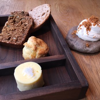 Aniar - Sourdough bread, brown soda bread, egg and cheese puff, butter with sea salt and fermented whipped butter (bland) with malty toasty bits - Irish Near Me - Galway, G Aniar - Sourdough bread, brown soda bread, egg and cheese puff, butter with sea salt and fermented whipped butter (bland) with malty toasty bits - Irish Near Me - Galway, G