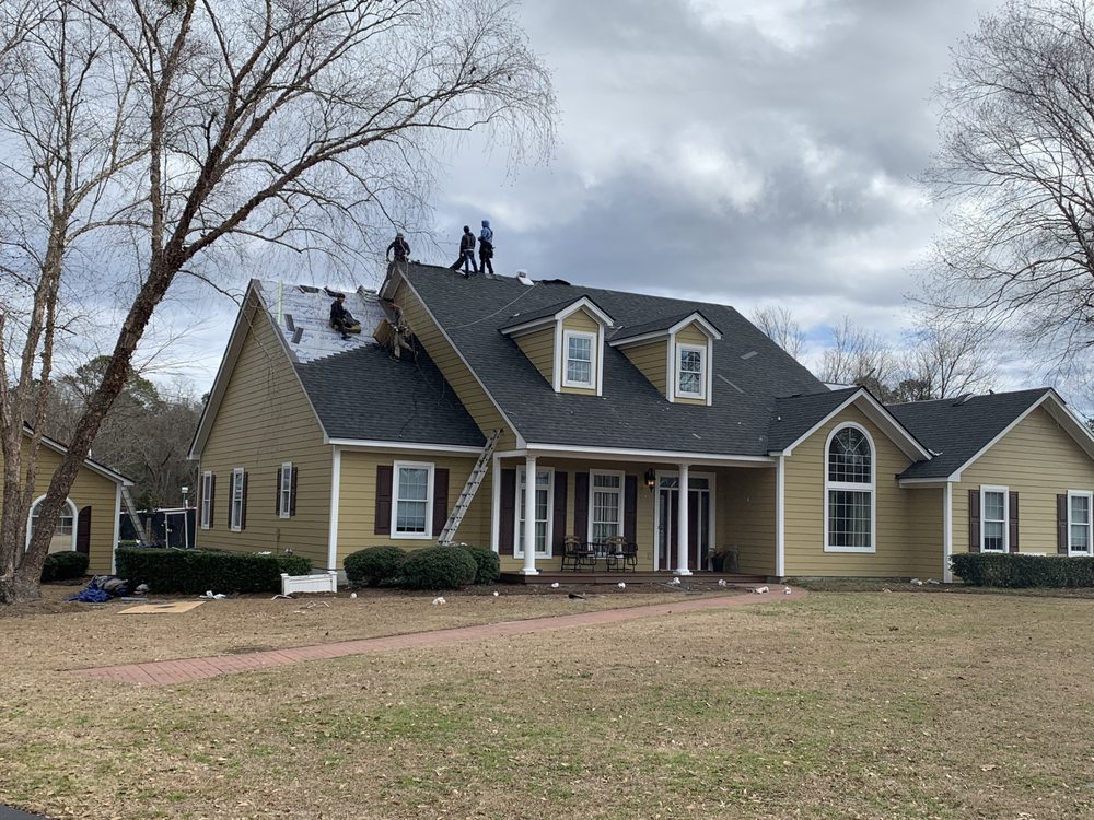 Slide of Rick Ross Exteriors and Roofing