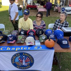Porter's Orchard Farm Market & Cider Mill - DAV members at Porter's Orchard through the Fall, with military hats for sale as fundraisers.