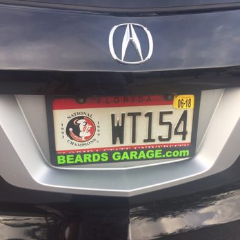 Beard's Garage - Took off our FSU metal frame to replace it with their plastic advertisement , without permission and broke our frame - Auto Repair Near Me - Jupiter, Florida