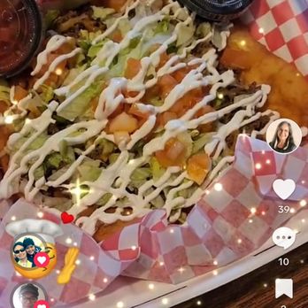 Indigenous Eats - Farmer's special, fry bread with ground beef topped with beans, lettuce, tomato, sour cream, jalapenos and salsa on the side! YUM!! - American Near Me - Spokane, Washington