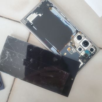 uBreakiFix by Asurion - This is the mangled phone returned to me by UBIF. - Electronics Repair Near Me - Smithtown, New York uBreakiFix by Asurion - This is the mangled phone returned to me by UBIF. - Electronics Repair Near Me - Smithtown, New York