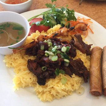 Pho Vina - Charbroiled pork, shrimp skewer, egg roll over butter rice - Vietnamese Near Me - Anaheim, California Pho Vina - Charbroiled pork, shrimp skewer, egg roll over butter rice - Vietnamese Near Me - Anaheim, California