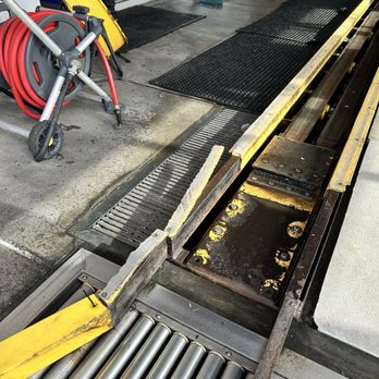 Quick Quack Car Wash - Damaged track not protected by rubber - Car Wash Near Me - Houston, Texas