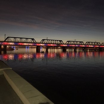 Tempe Town Lake - Light rail bridge lighting up with red, white, and blue. - Lakes Near Me - Tempe, Arizona Tempe Town Lake - Light rail bridge lighting up with red, white, and blue. - Lakes Near Me - Tempe, Arizona