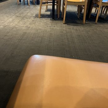 Buffalo Wild Wings - Floor that remained dirty for the full hour we were visiting - Sports Bars Near Me - Hampton, Virginia