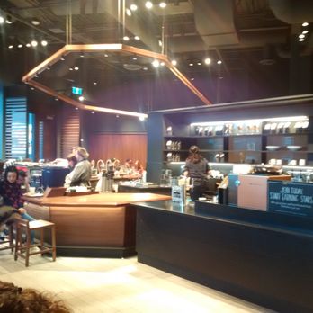 Starbucks Reserve - Inside of the store. Cold brew taps at centre - Coffee & Tea Near Me - Toronto, Ontario