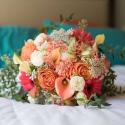 Petal To The Metal Flowers - Coral, peach and cream are a beautiful combination for a bridal bouquet