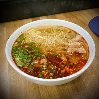 Noodle-Ly - Khao Soi: rice noodles, chicken broth, minced pork, chili garlic sauce, topped with cabbage, cilantro, chicharrones - Noodles Near Me - Mammoth Lakes, California Noodle-Ly - Khao Soi: rice noodles, chicken broth, minced pork, chili garlic sauce, topped with cabbage, cilantro, chicharrones - Noodles Near Me - Mammoth Lakes, California